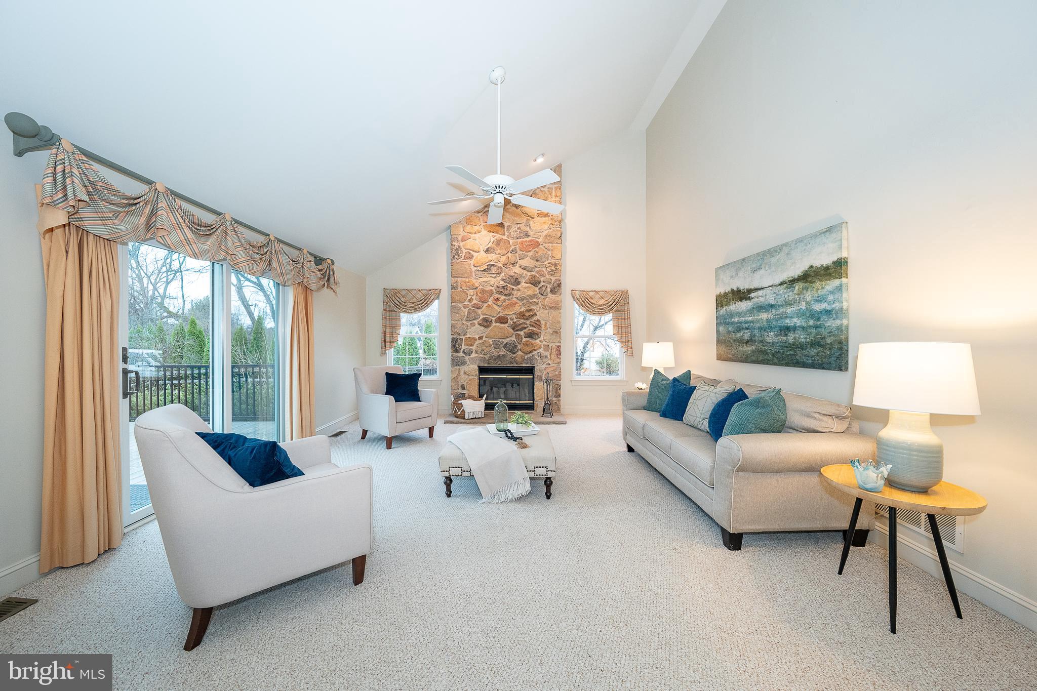 824 Waverly Road Kennett Square, PA 19348 - Photo 14 of 42 a living room with fireplace furniture and a large window