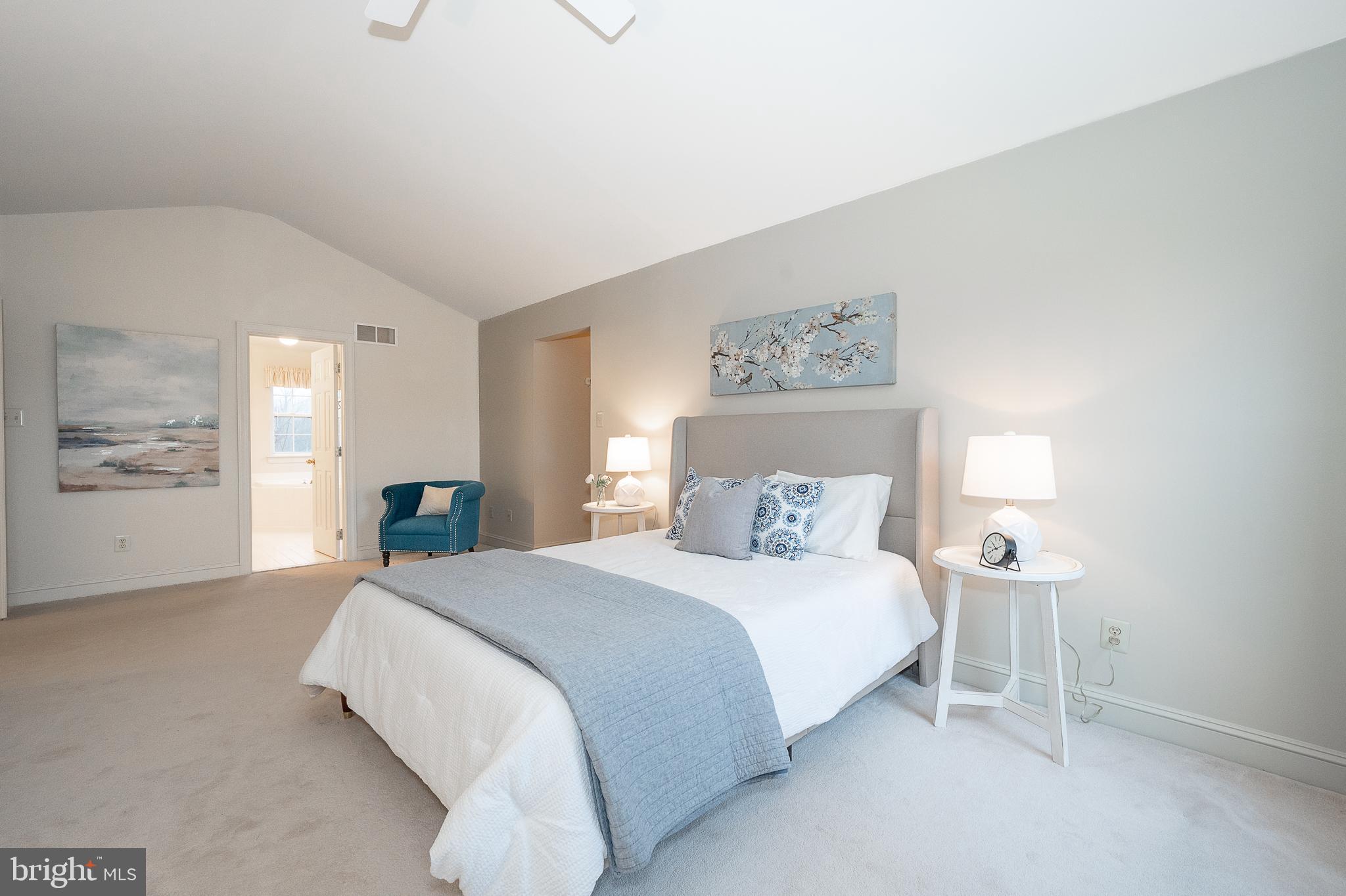 824 Waverly Road Kennett Square, PA 19348 - Photo 20 of 42 a bedroom with a bed and painting on the wall