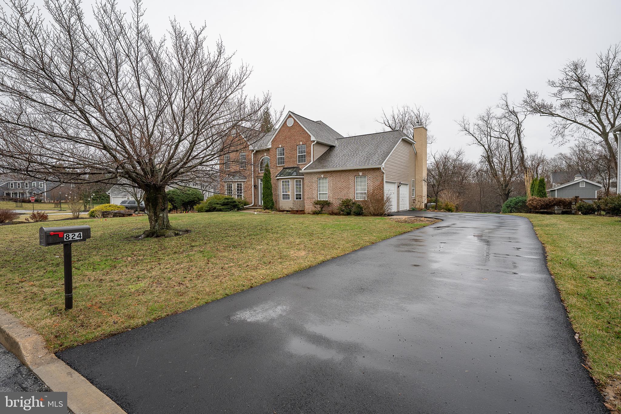 824 Waverly Road Kennett Square, PA 19348 - Photo 2 of 42 a view of a street with a house on the side of it