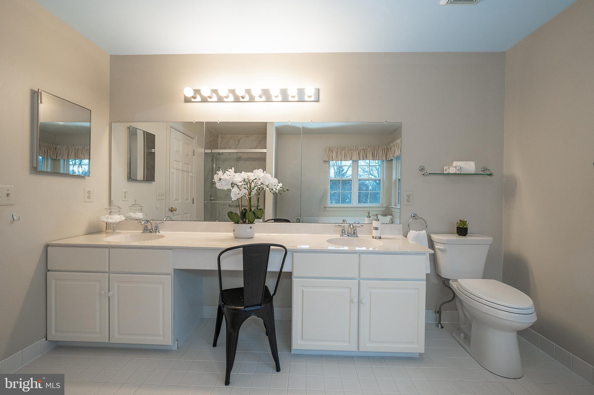 824 Waverly Road Kennett Square, PA 19348 - Photo 26 of 42 a bathroom with a toilet sink and mirror