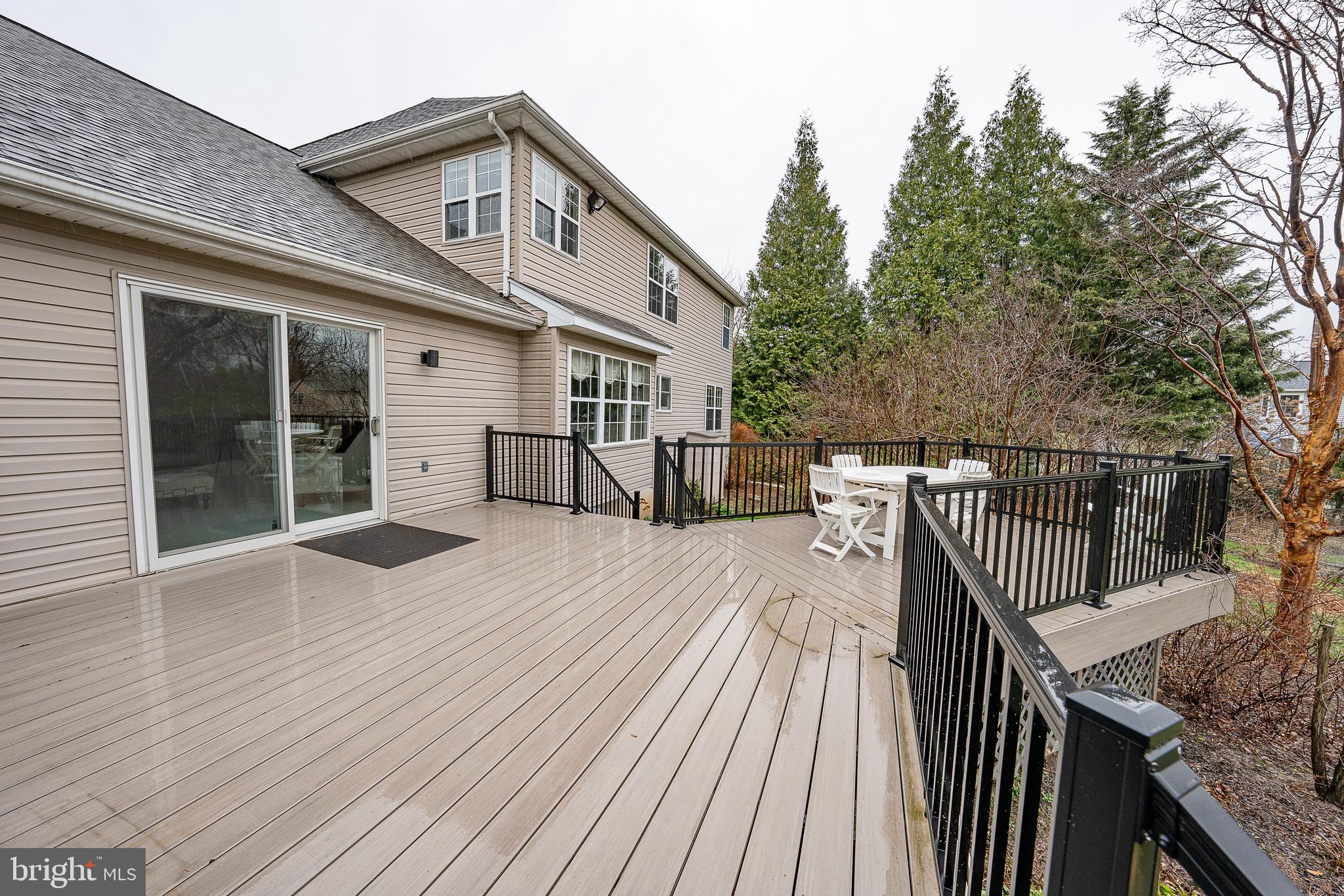 824 Waverly Road Kennett Square, PA 19348 - Photo 39 of 42 a front view of a house with a barbeque and wooden floor