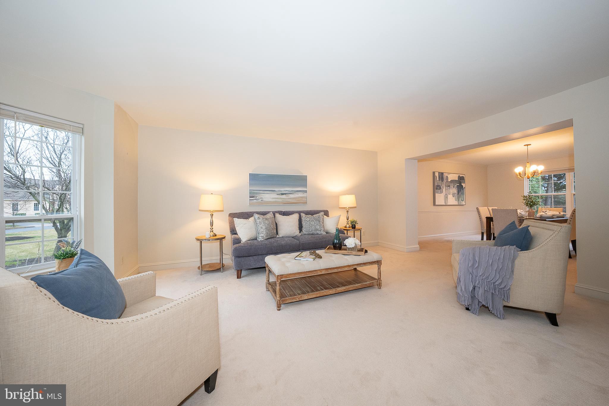 824 Waverly Road Kennett Square, PA 19348 - Photo 5 of 42 a living room with furniture and a large window