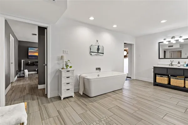 a kitchen with a stove top oven sink and cabinets