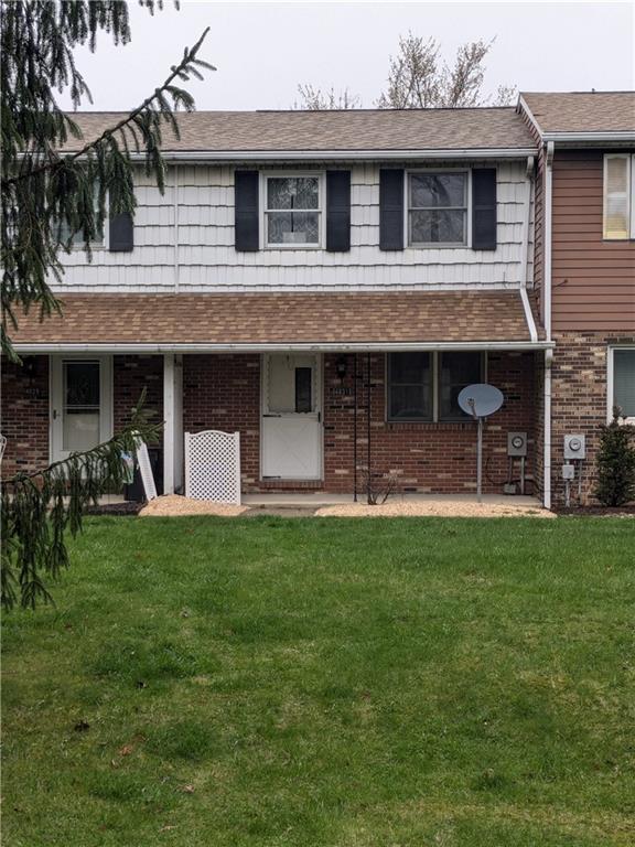 4831 Lucerne Road Indiana, PA 15701 - Photo 1 of 12 Front of Condo with yard and pine trees