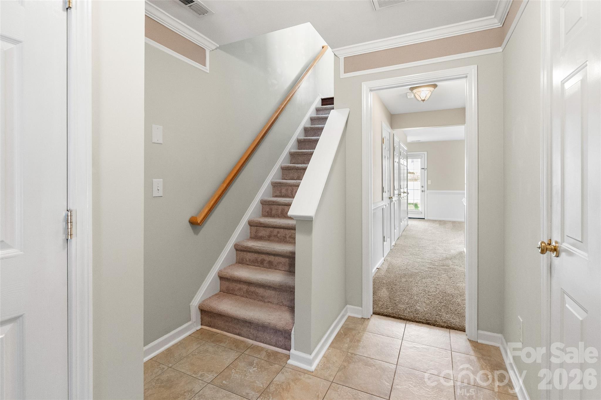 104 Rock Ridge Lane Mount Holly, NC 28120 - Photo 3 of 48 a view of a hallway with entryway