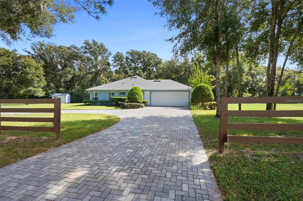 234 Geneva Heights Road Geneva, FL 32732 - Photo 4 of 57 Pavers, and Check out the 4-Board Farm Fence - Easy on the Eyes!