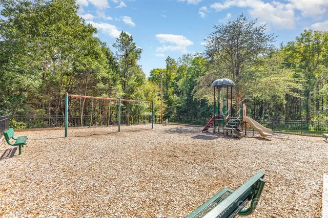 a view of a park with swings