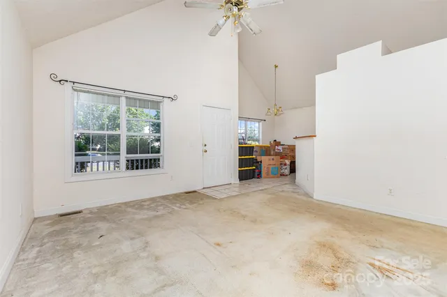a view of a room with cabinet and a window