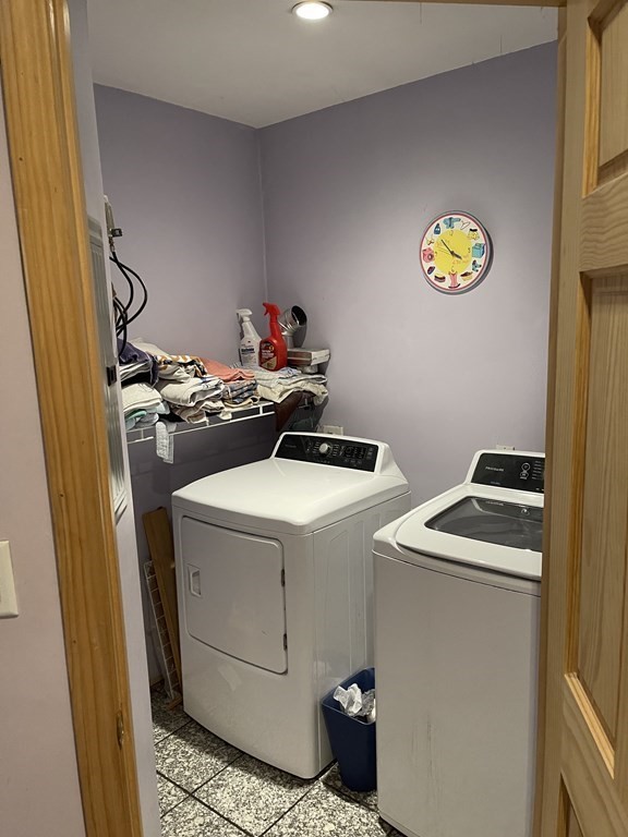 101 Wright Street Arlington, MA 02474 - Photo 11 of 18 a utility room with dryer and washer