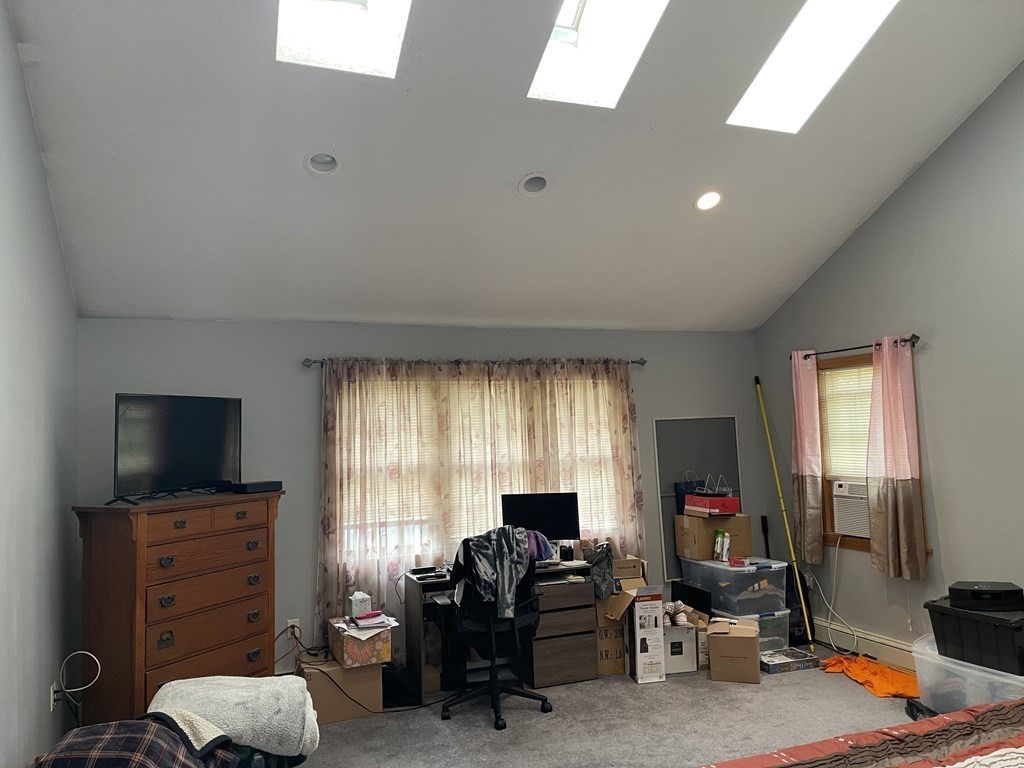 101 Wright Street Arlington, MA 02474 - Photo 14 of 18 a view of a livingroom with workspace and a window
