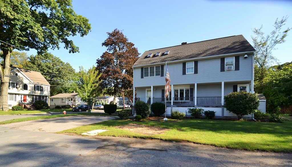 101 Wright Street Arlington, MA 02474 - Photo 3 of 18 a front view of house with yard and green space