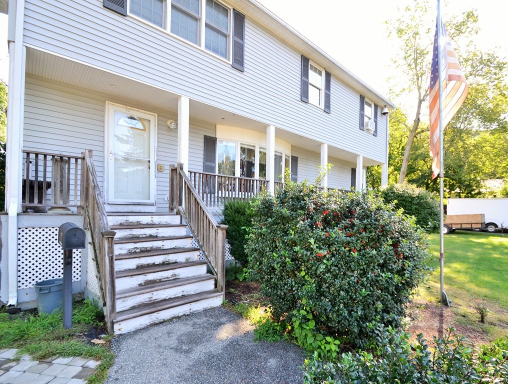 101 Wright Street Arlington, MA 02474 - Photo 5 of 18 a view of a house with backyard and porch