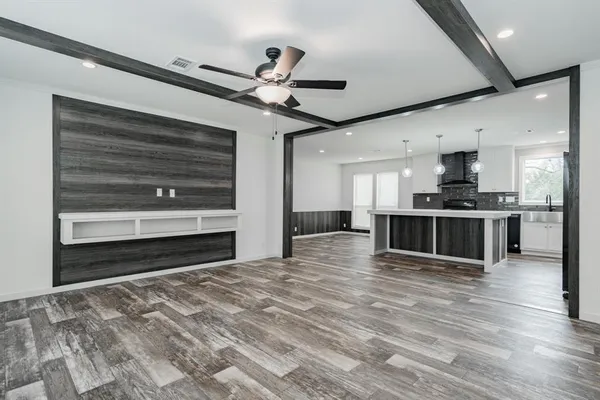 a view of kitchen with cabinets and stainless steel appliances