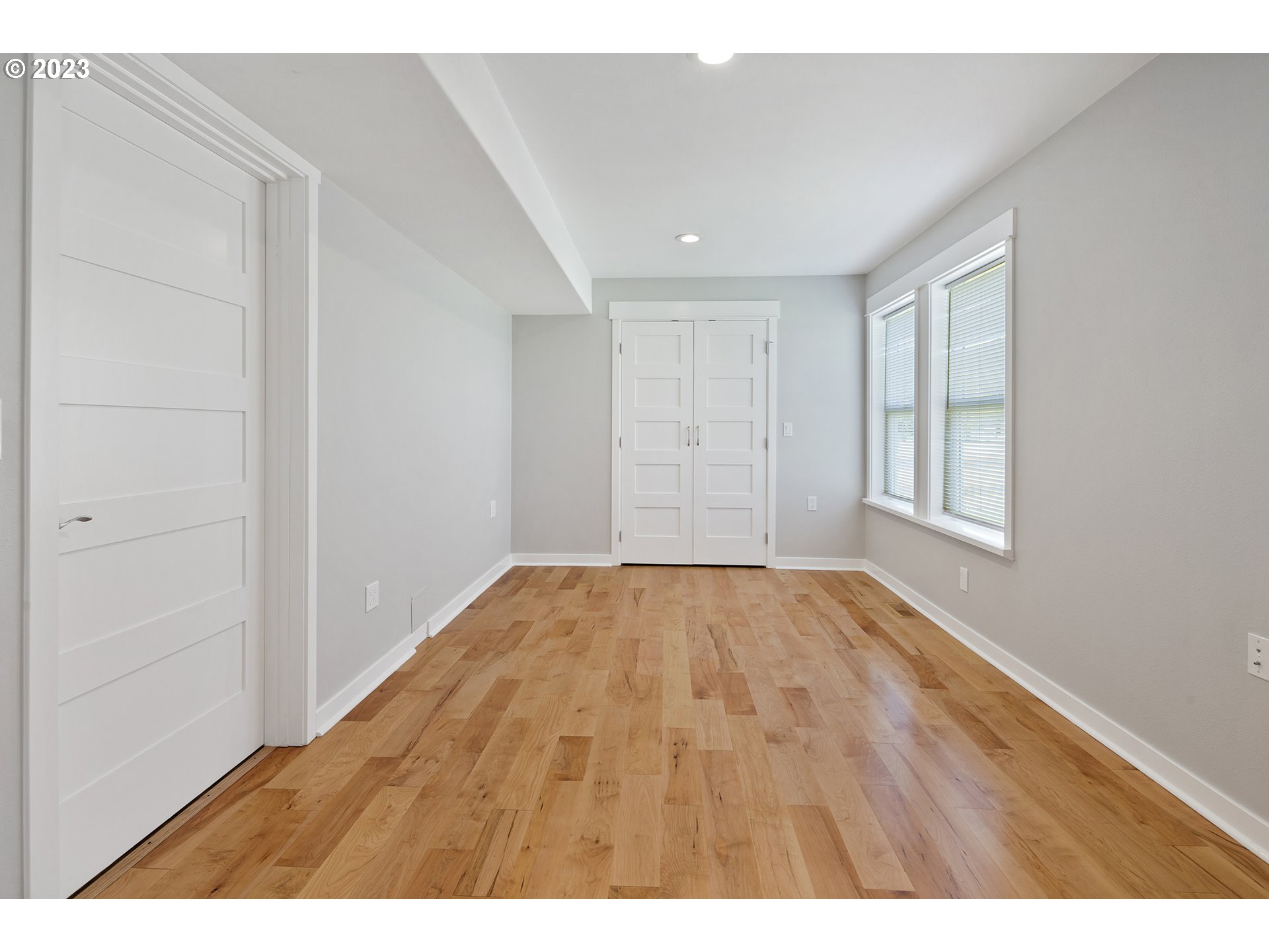 906 Toliver Road Molalla, OR 97038 - Photo 3 of 39 a view of an empty room and wooden floor