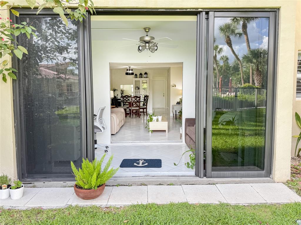2350 Northeast 14th Street Causeway, Unit 108 Pompano Beach, FL 33062 - Photo 36 of 38 a view of a entryway door of the house