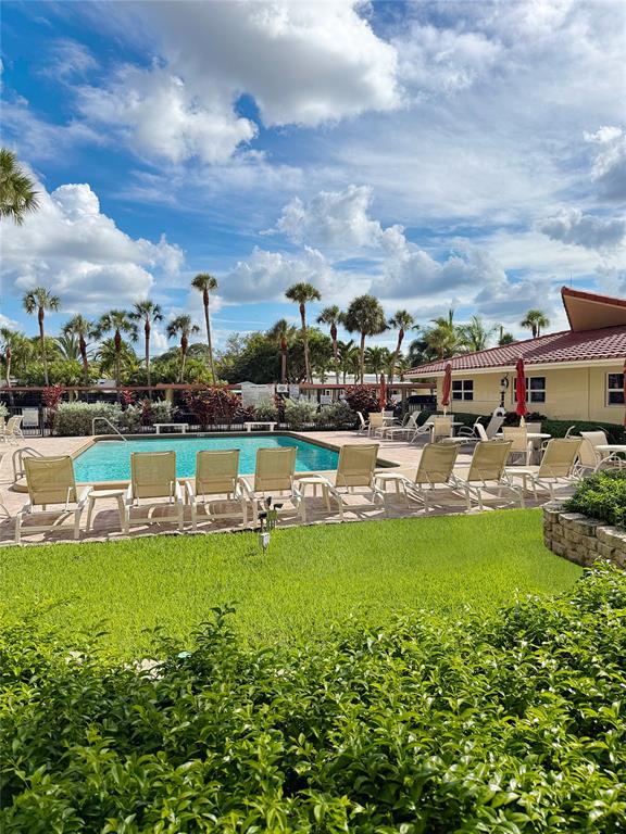 2350 Northeast 14th Street Causeway, Unit 108 Pompano Beach, FL 33062 - Photo 38 of 38 a view of a lake with houses