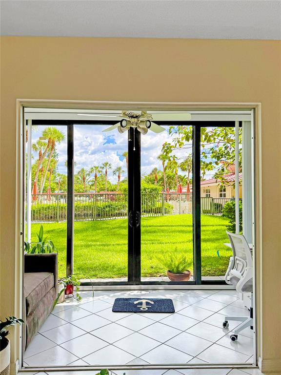 2350 Northeast 14th Street Causeway, Unit 108 Pompano Beach, FL 33062 - Photo 5 of 38 a view of a room with a large window