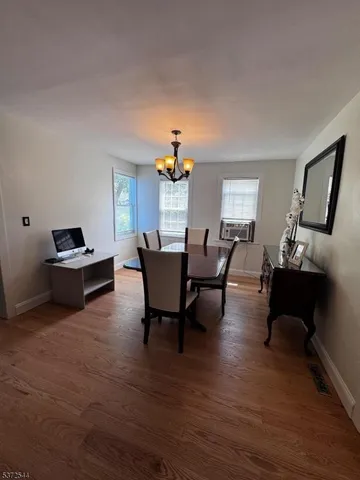 a kitchen with lots of counter top space and stainless steel appliances