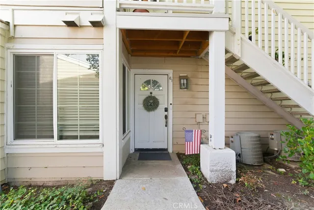 a front view of a house with outdoor space