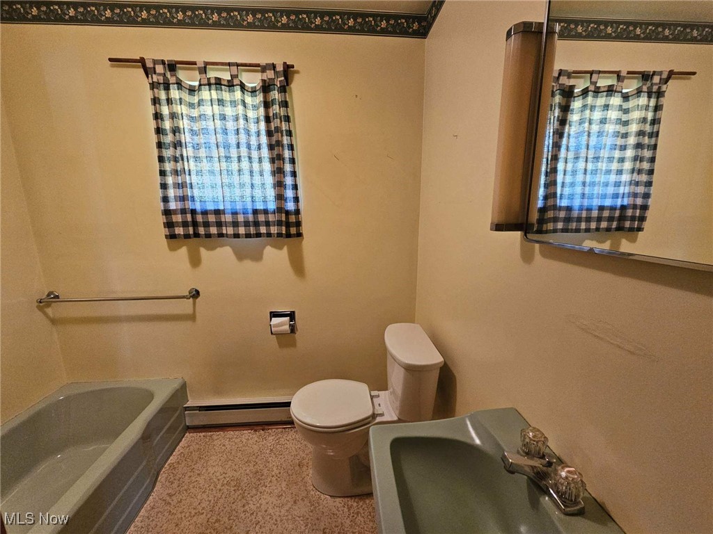 8125 Scio Road Scio, OH 43988 - Photo 9 of 16 Full bathroom with a bathtub and baseboard heating