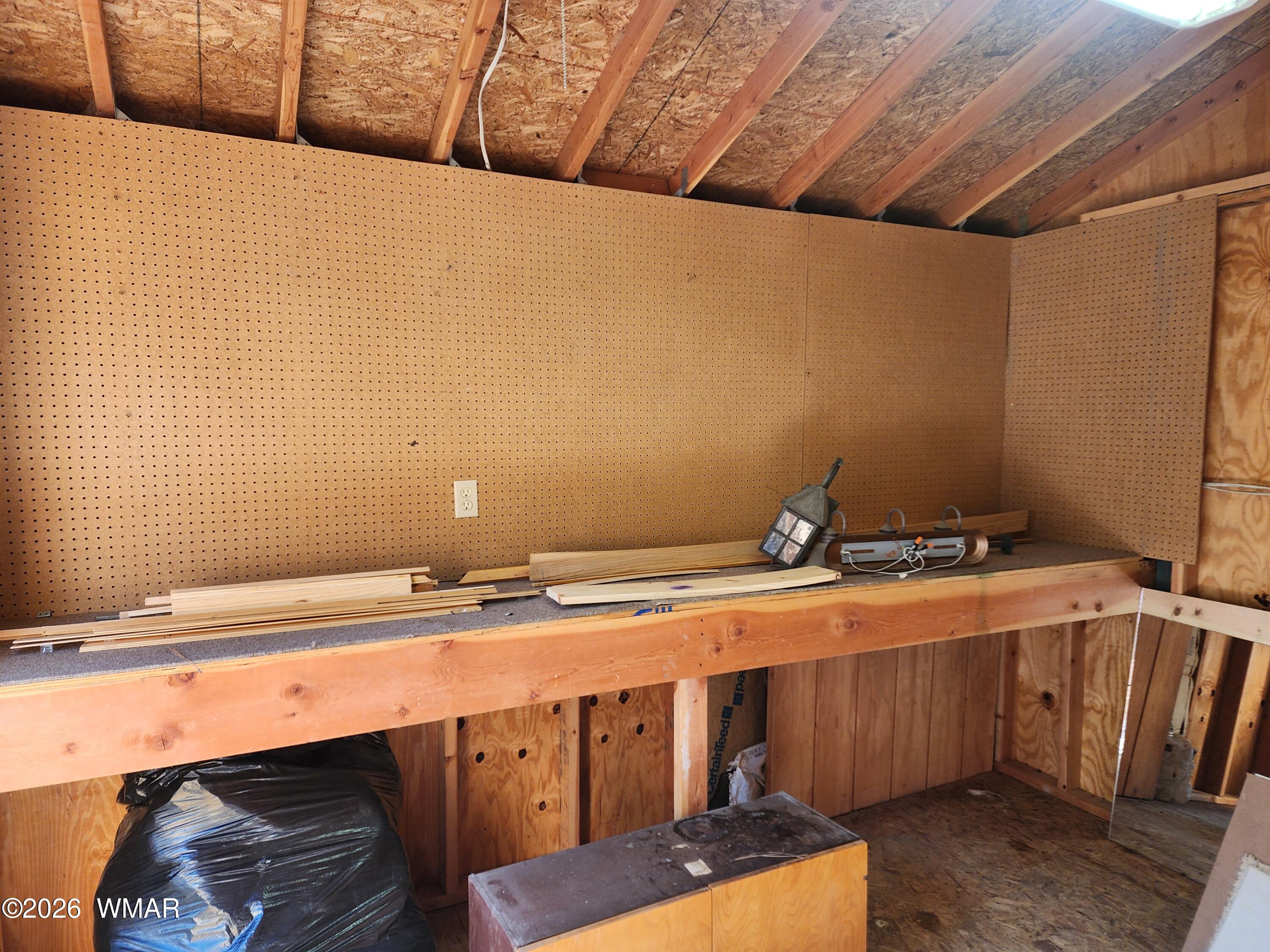 718 Eagle Loop Lakeside, AZ 85929 - Photo 29 of 36 Work Bench in the Shed