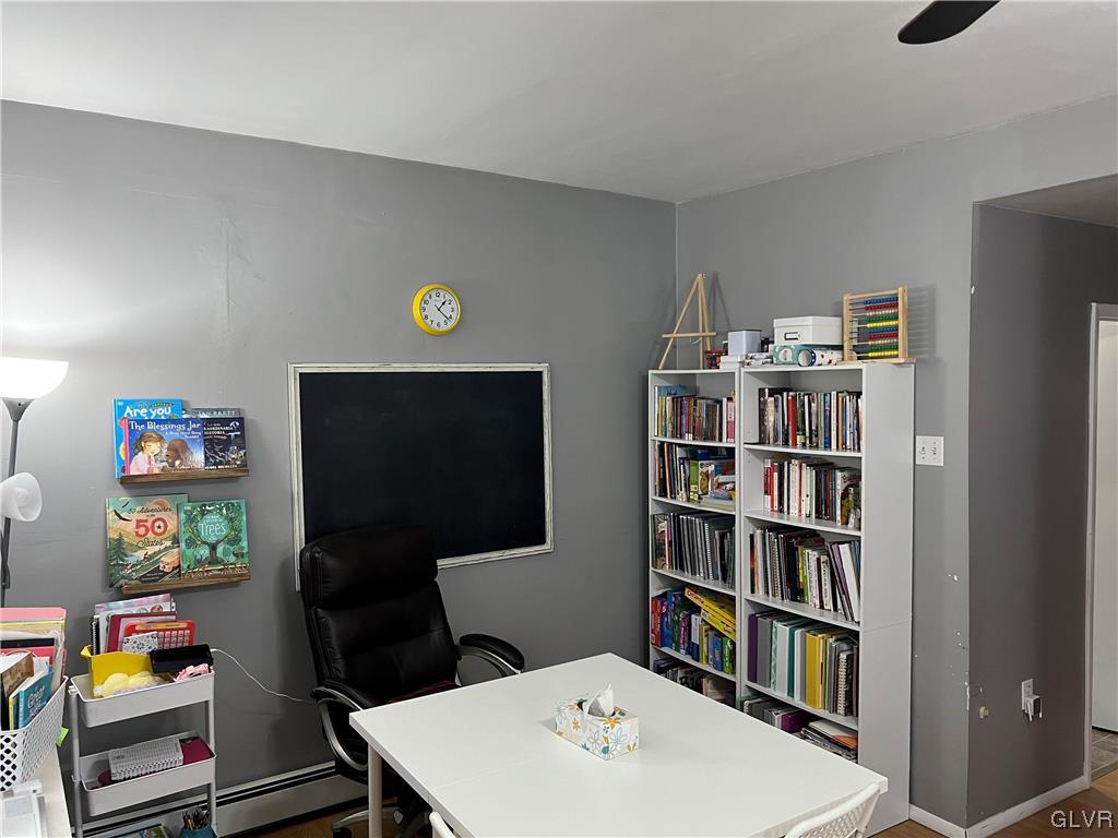 151 West 16th Street Northampton, PA 18067 - Photo 4 of 18 a view of a workspace with furniture and a flat screen tv