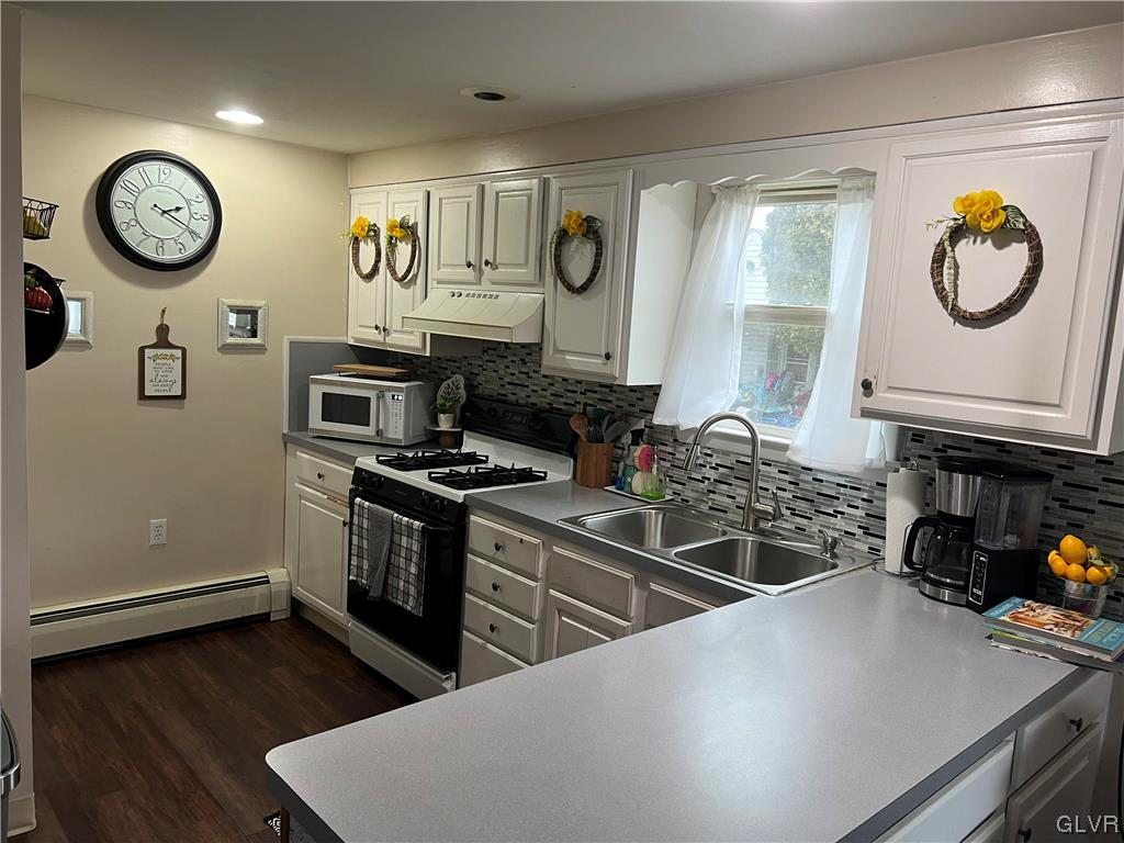 151 West 16th Street Northampton, PA 18067 - Photo 6 of 18 a kitchen with stainless steel appliances granite countertop a stove and a sink