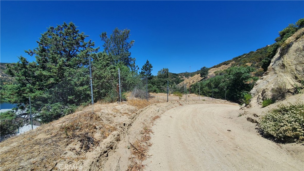 0 Grand View Lake Hughes, CA 93532 - Photo 3 of 19 a view of a dry yard with trees