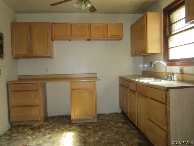 11985 River Road Chesterfield, VA 23838 - Photo 4 of 14 a kitchen with a sink and cabinets