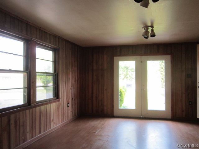 11985 River Road Chesterfield, VA 23838 - Photo 7 of 14 a view of an empty room with wooden floor and a window