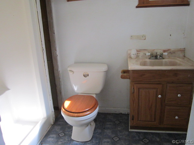 11985 River Road Chesterfield, VA 23838 - Photo 9 of 14 a bathroom with a toilet and a sink