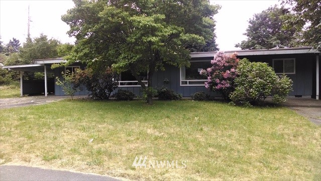 607 Sheridan Road Bremerton, WA 98310 - Photo 2 of 14 a view of a backyard with swimming pool