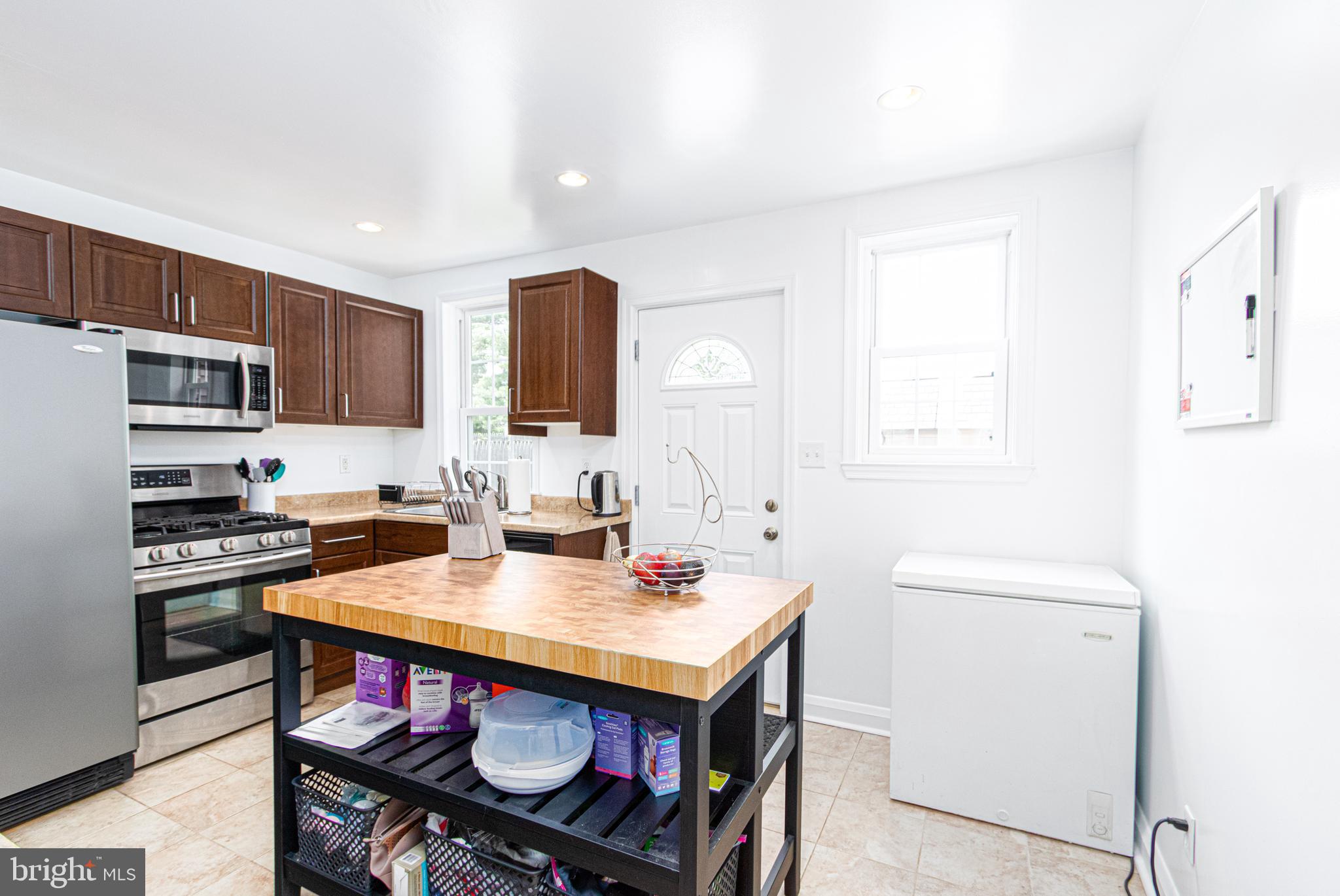 1668 Yakona Road Baltimore, MD 21286 - Photo 21 of 50 Exit to rear patio with sitting area & fire pit!
