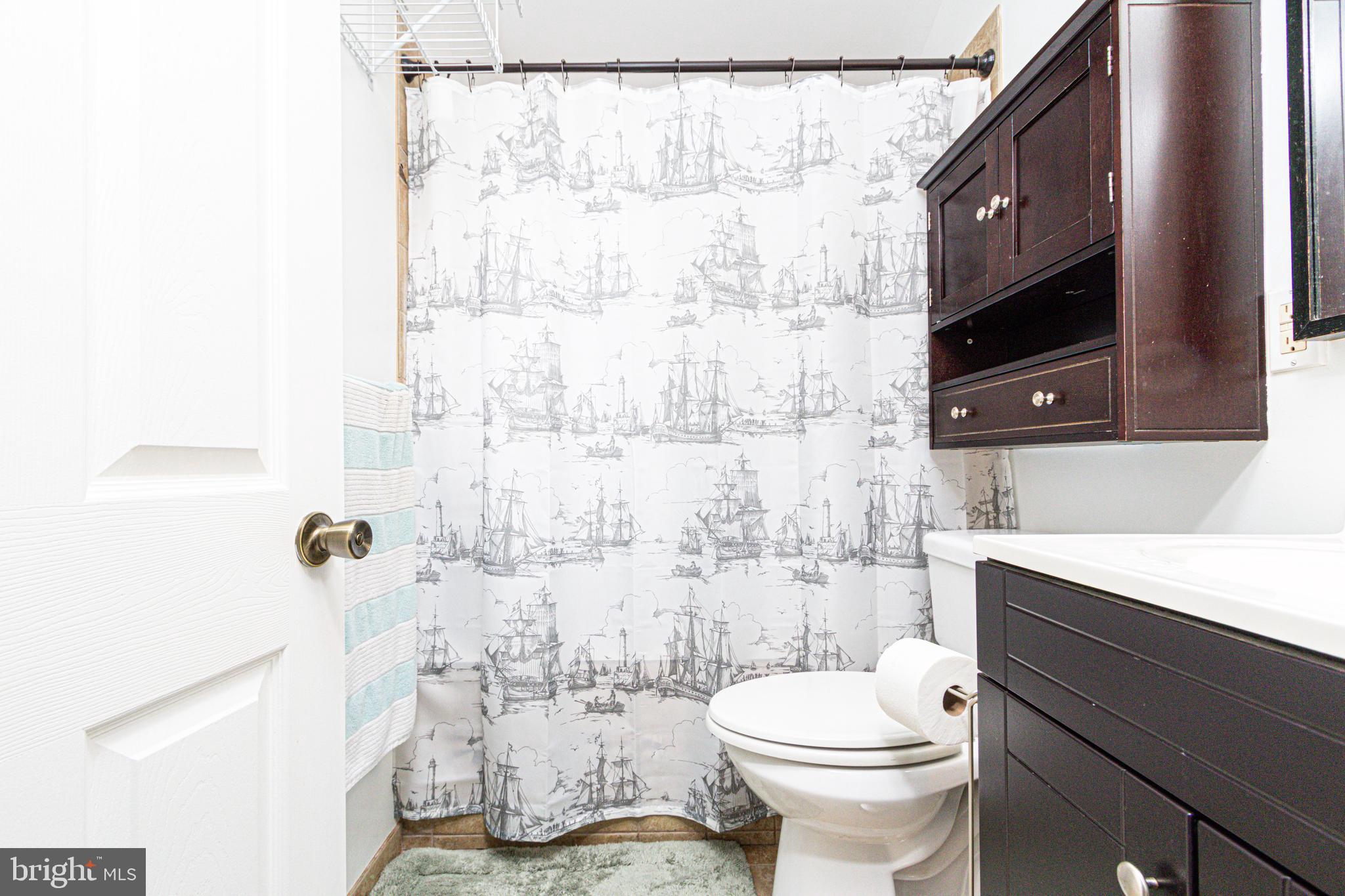 1668 Yakona Road Baltimore, MD 21286 - Photo 28 of 50 Nice tile surround, vanity, & med cabinet!