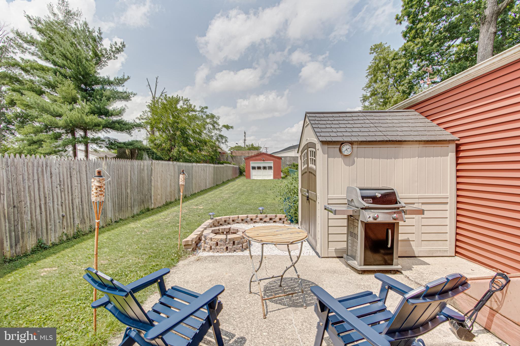 1668 Yakona Road Baltimore, MD 21286 - Photo 36 of 50 Patio with fire pit, shed, and long rear yard!