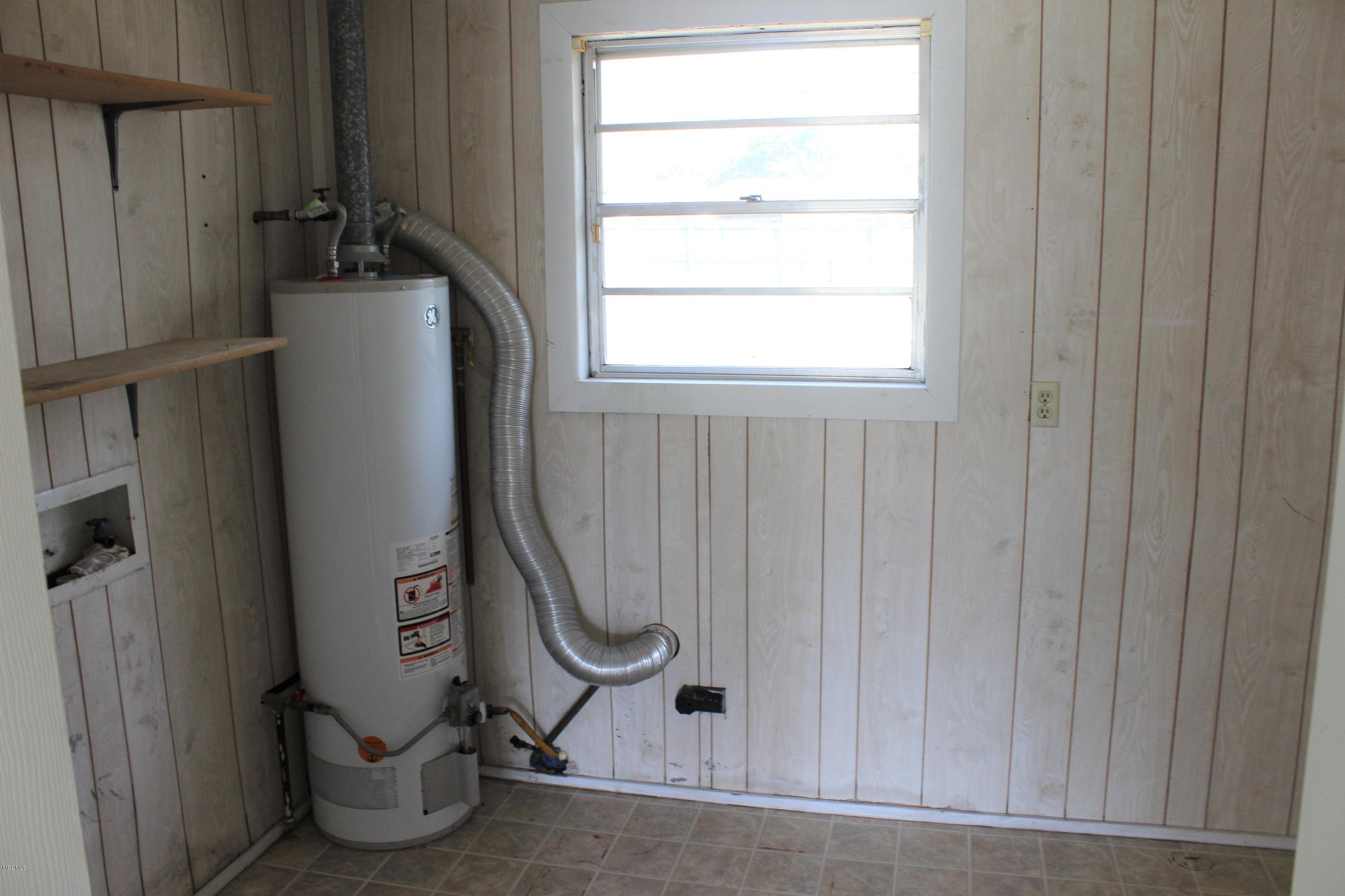 327 Mincheck Road Ocean Springs, MS 39564 - Photo 14 of 17 Laundry Room Inside
