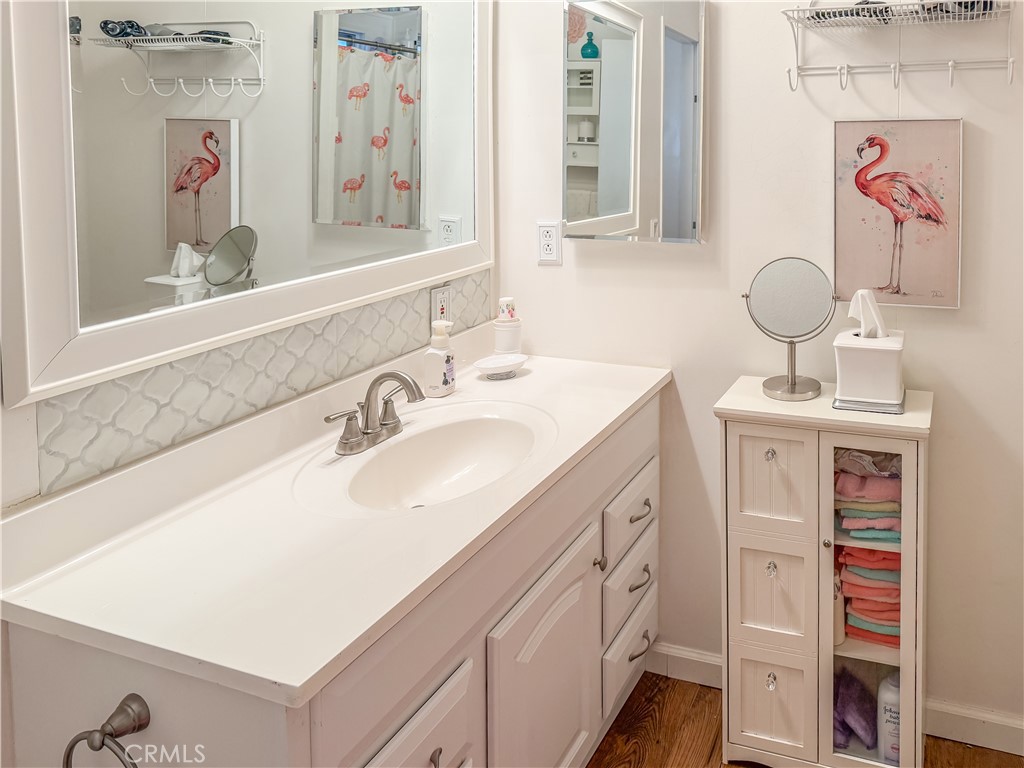 547 Channel Way Needles, CA 92363 - Photo 11 of 15 a bathroom with a sink vanity and a mirror