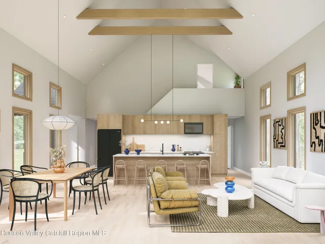 a living room with furniture and a table