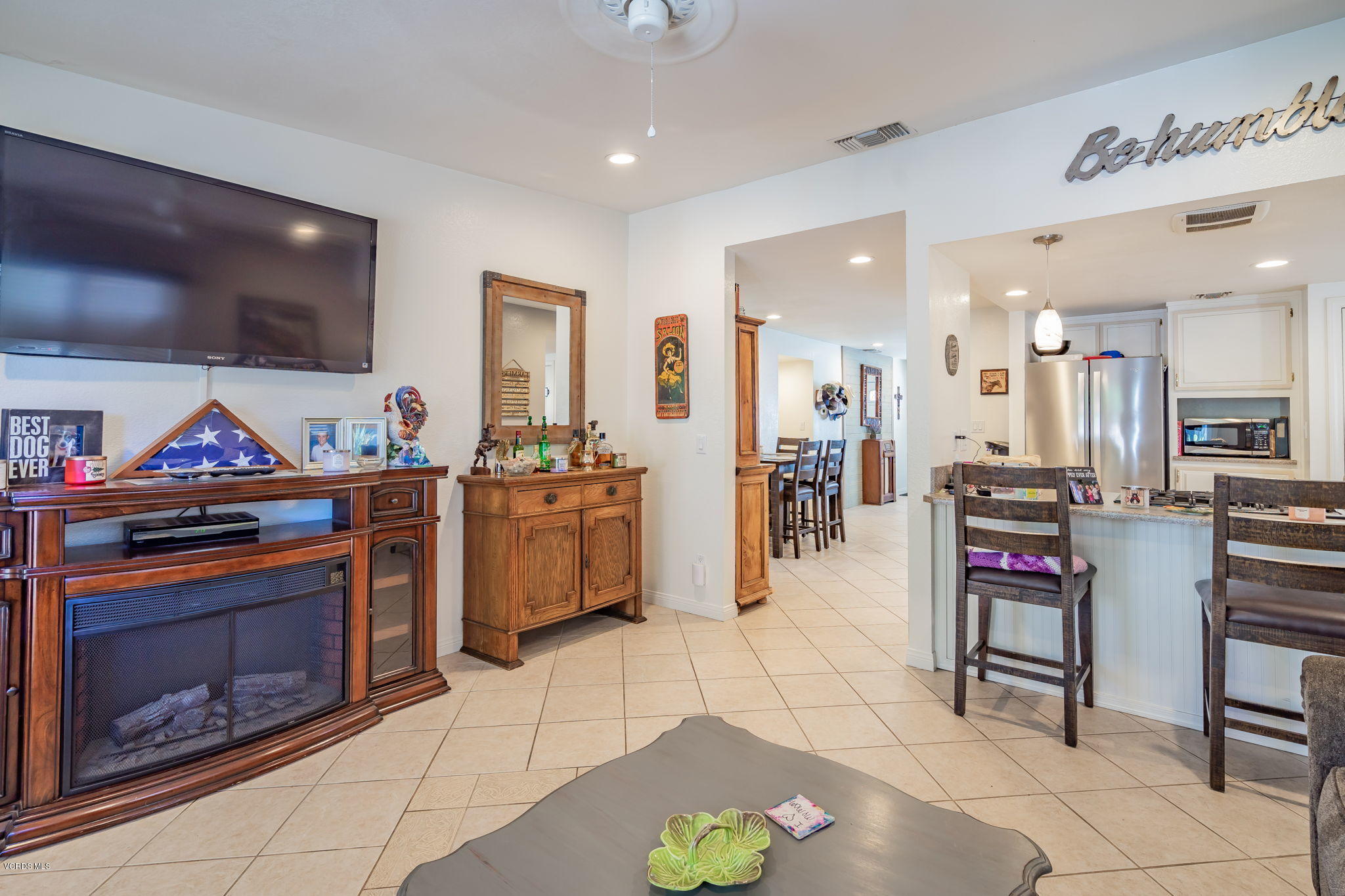 6116 Al Way Simi Valley, CA 93063 - Photo 20 of 55 a kitchen with stainless steel appliances granite countertop a stove and a sink