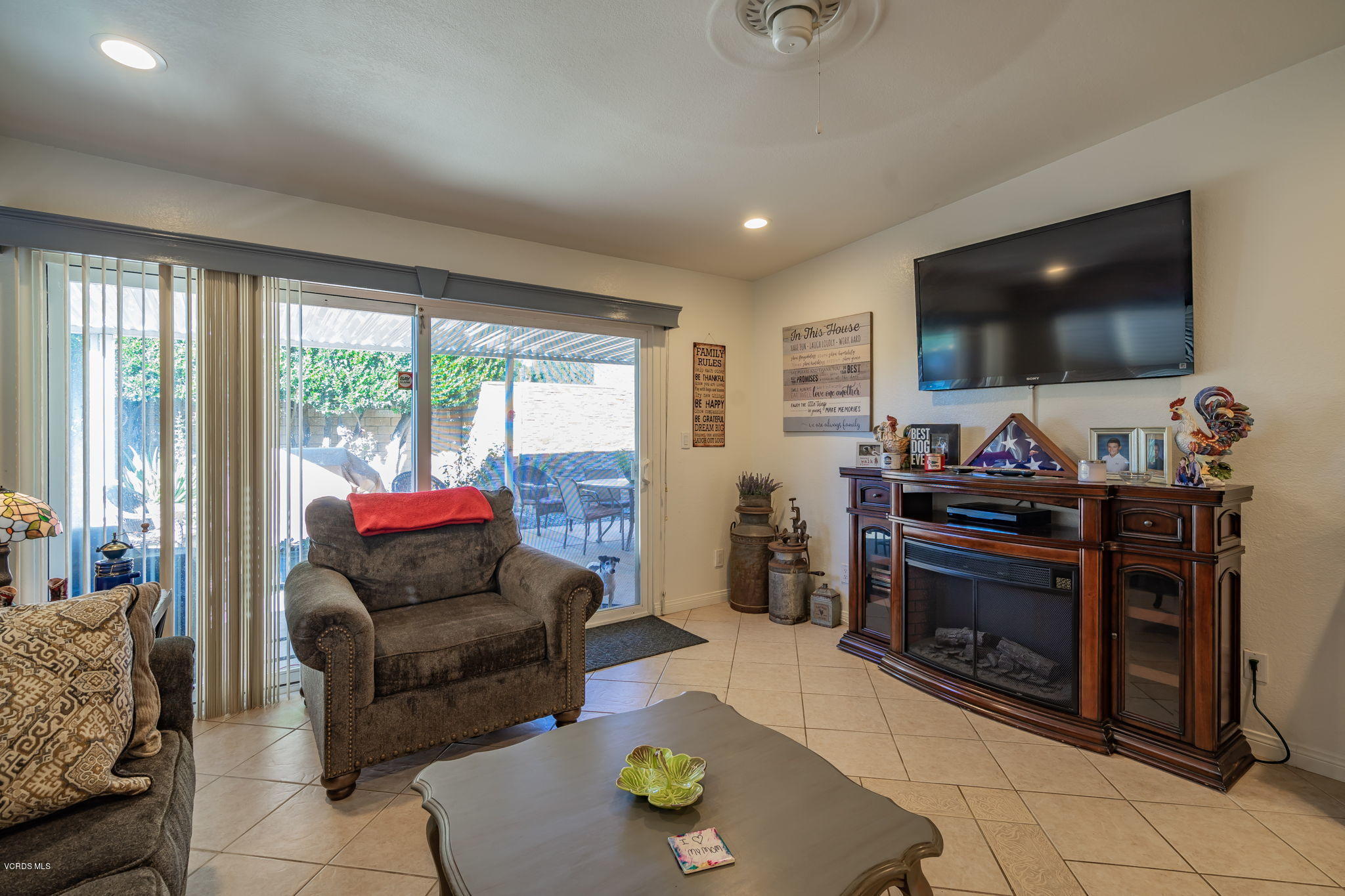 6116 Al Way Simi Valley, CA 93063 - Photo 21 of 55 a living room with furniture and a flat screen tv