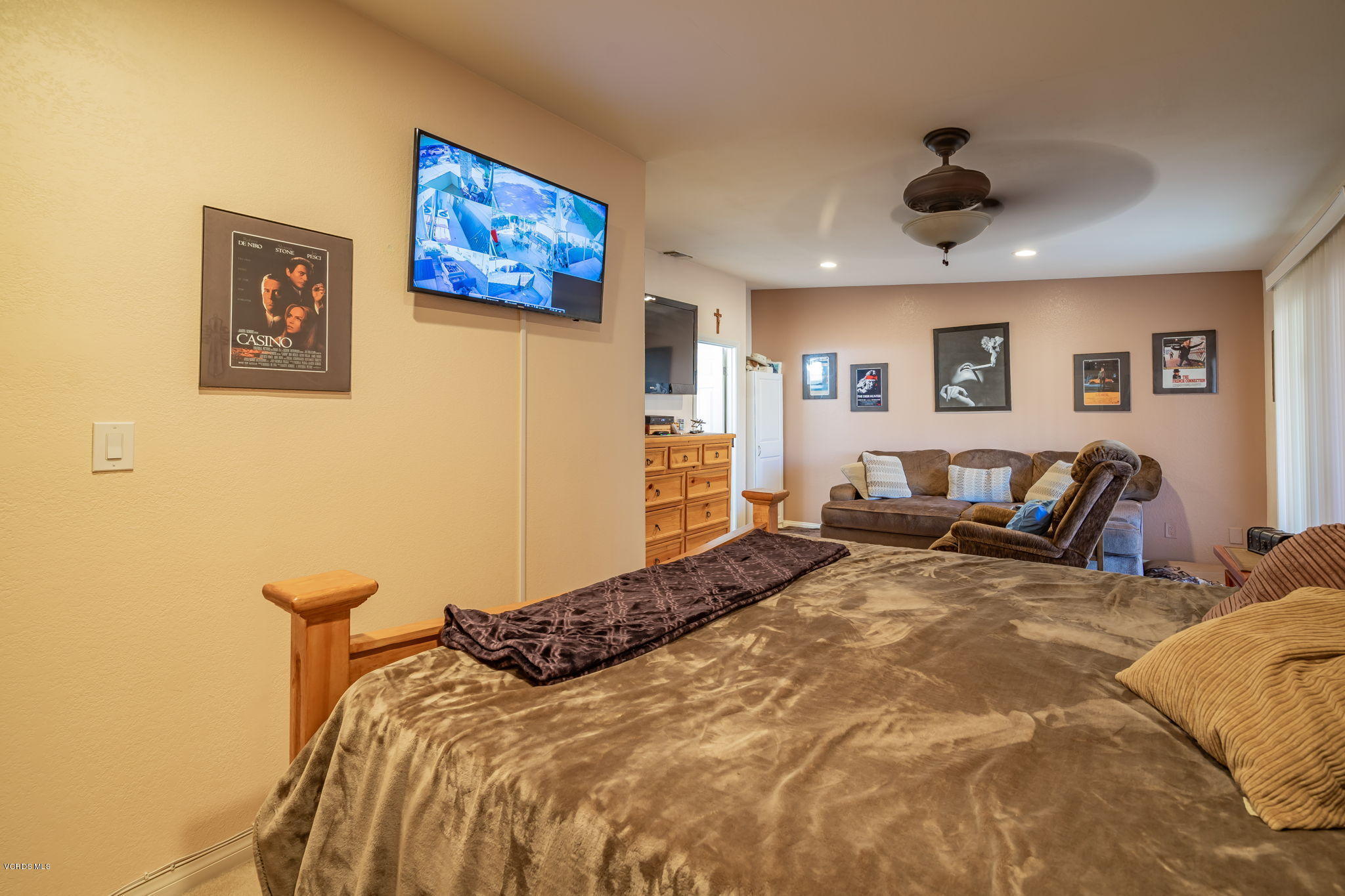 6116 Al Way Simi Valley, CA 93063 - Photo 28 of 55 a bedroom with a large bed and a large mirror