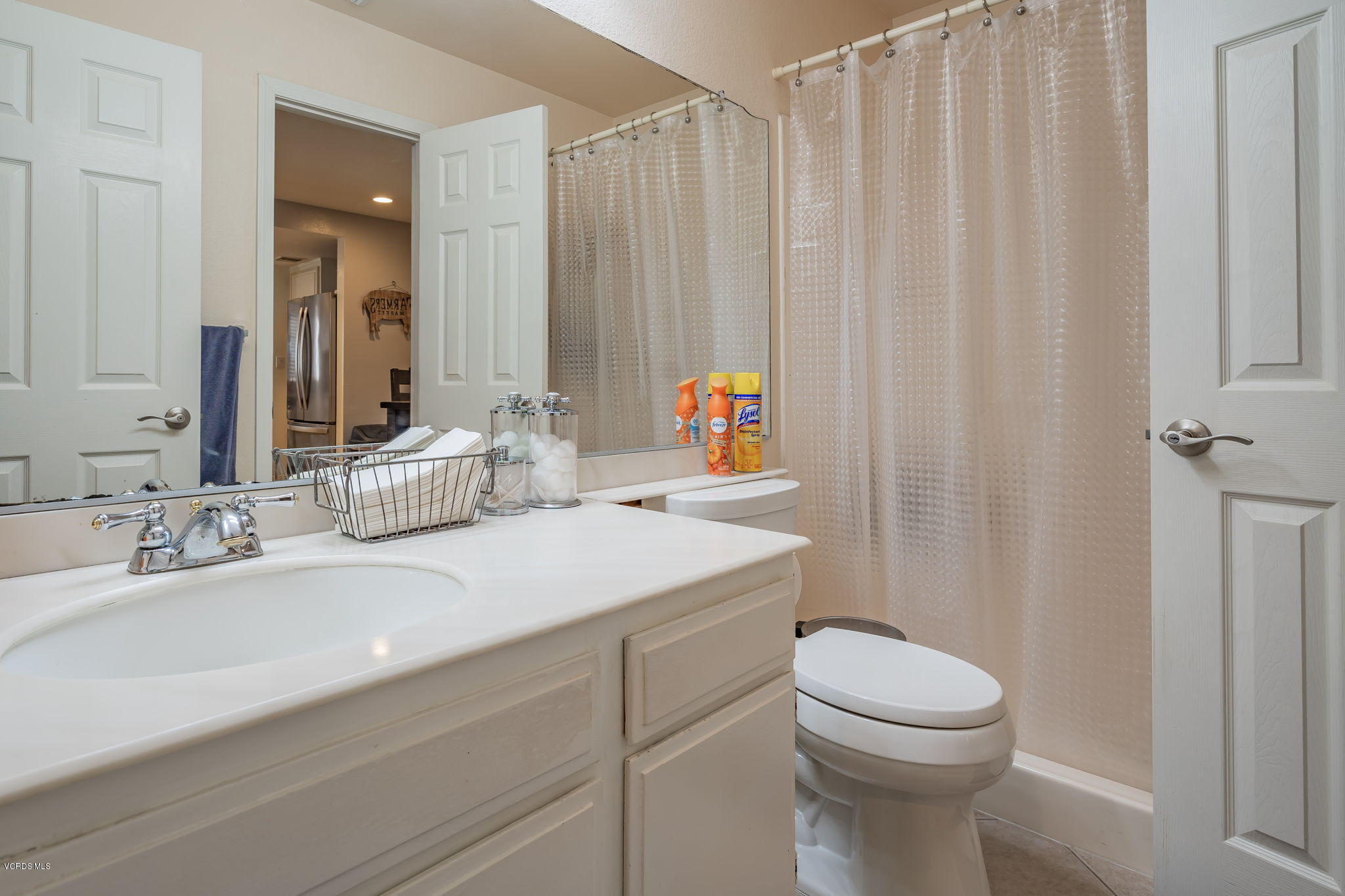 6116 Al Way Simi Valley, CA 93063 - Photo 29 of 55 a bathroom with a sink a toilet and shower