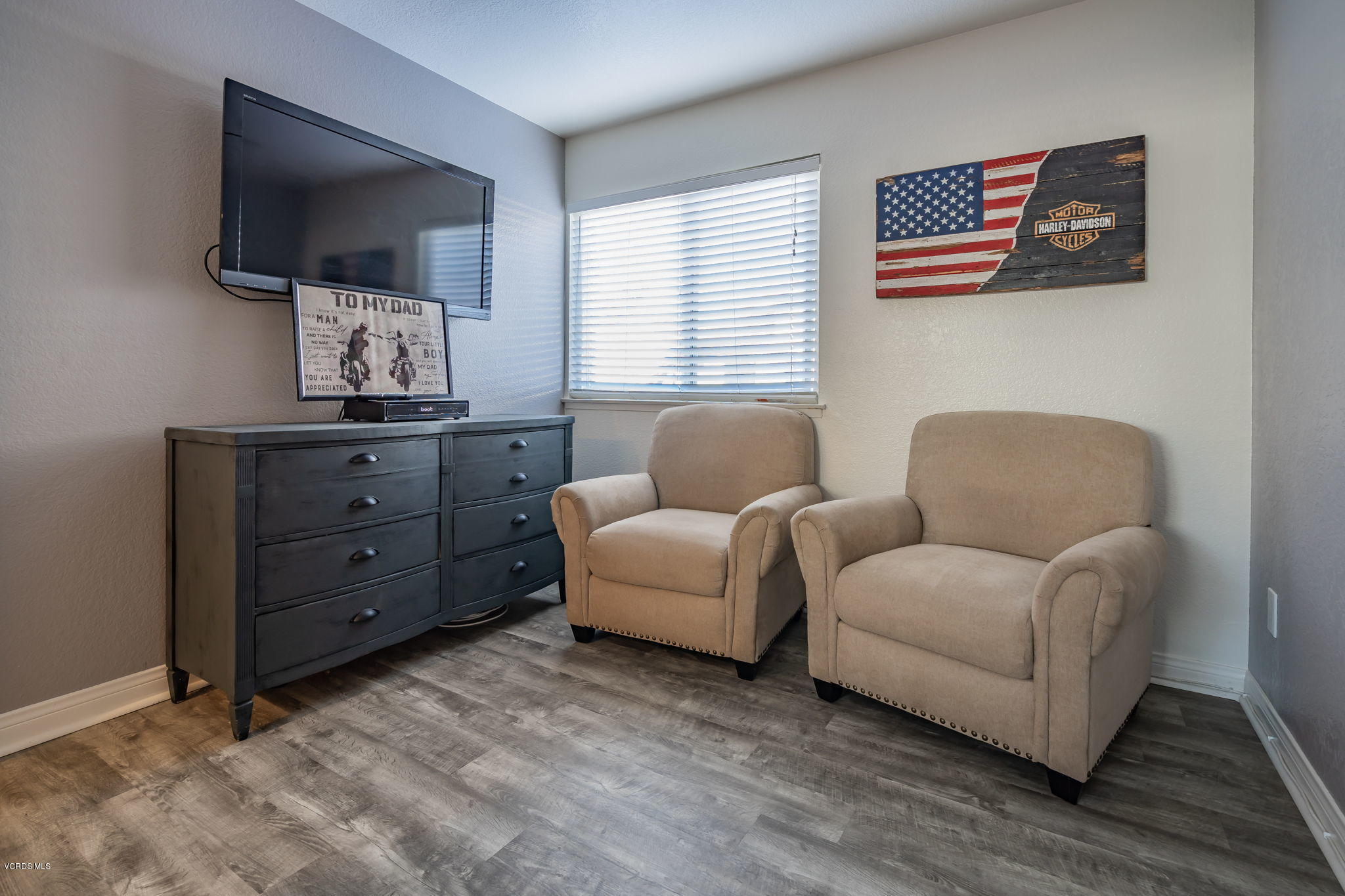 6116 Al Way Simi Valley, CA 93063 - Photo 36 of 55 a living room with furniture and a flat screen tv
