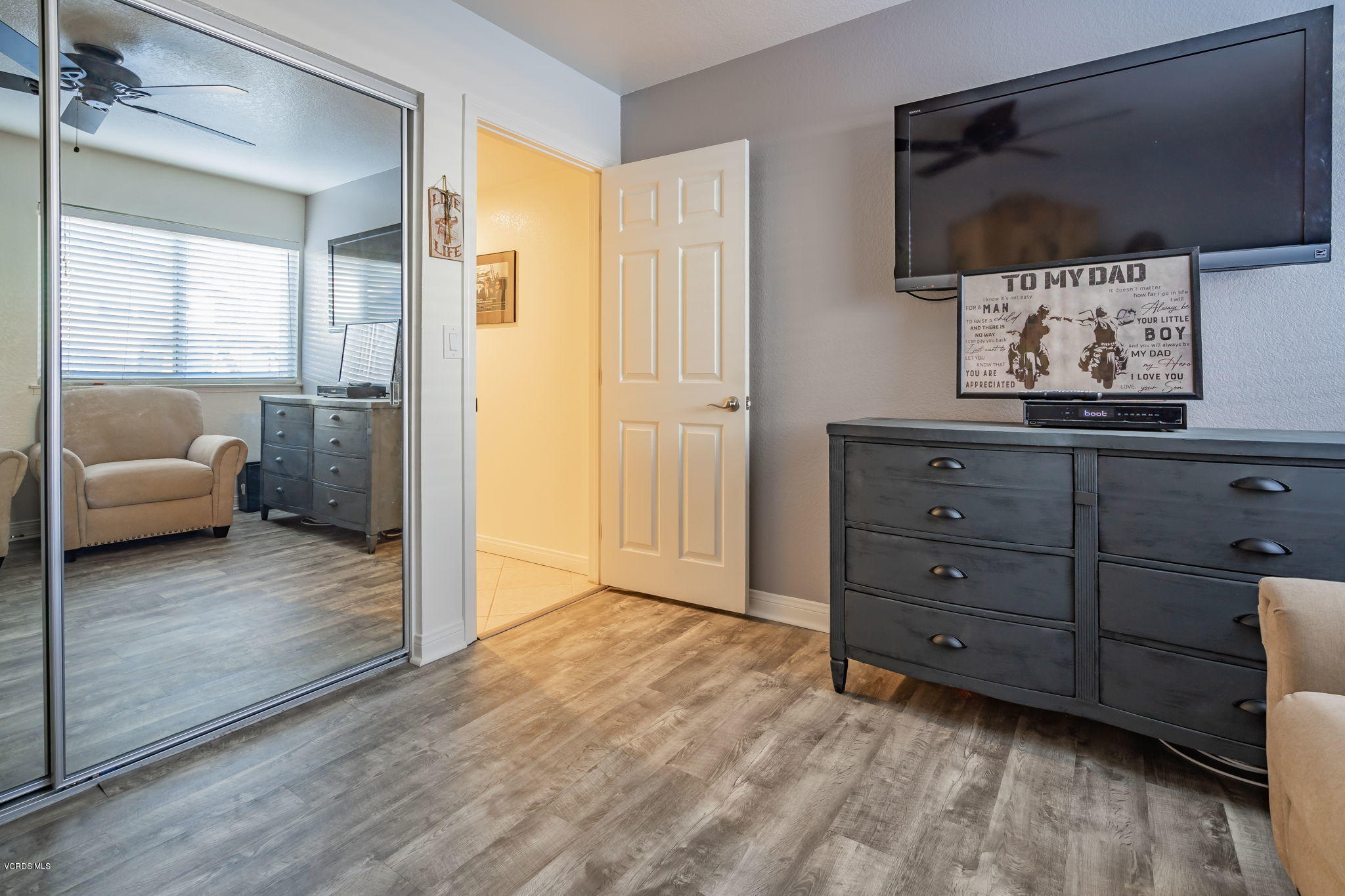6116 Al Way Simi Valley, CA 93063 - Photo 37 of 55 a living room with furniture and a flat screen tv