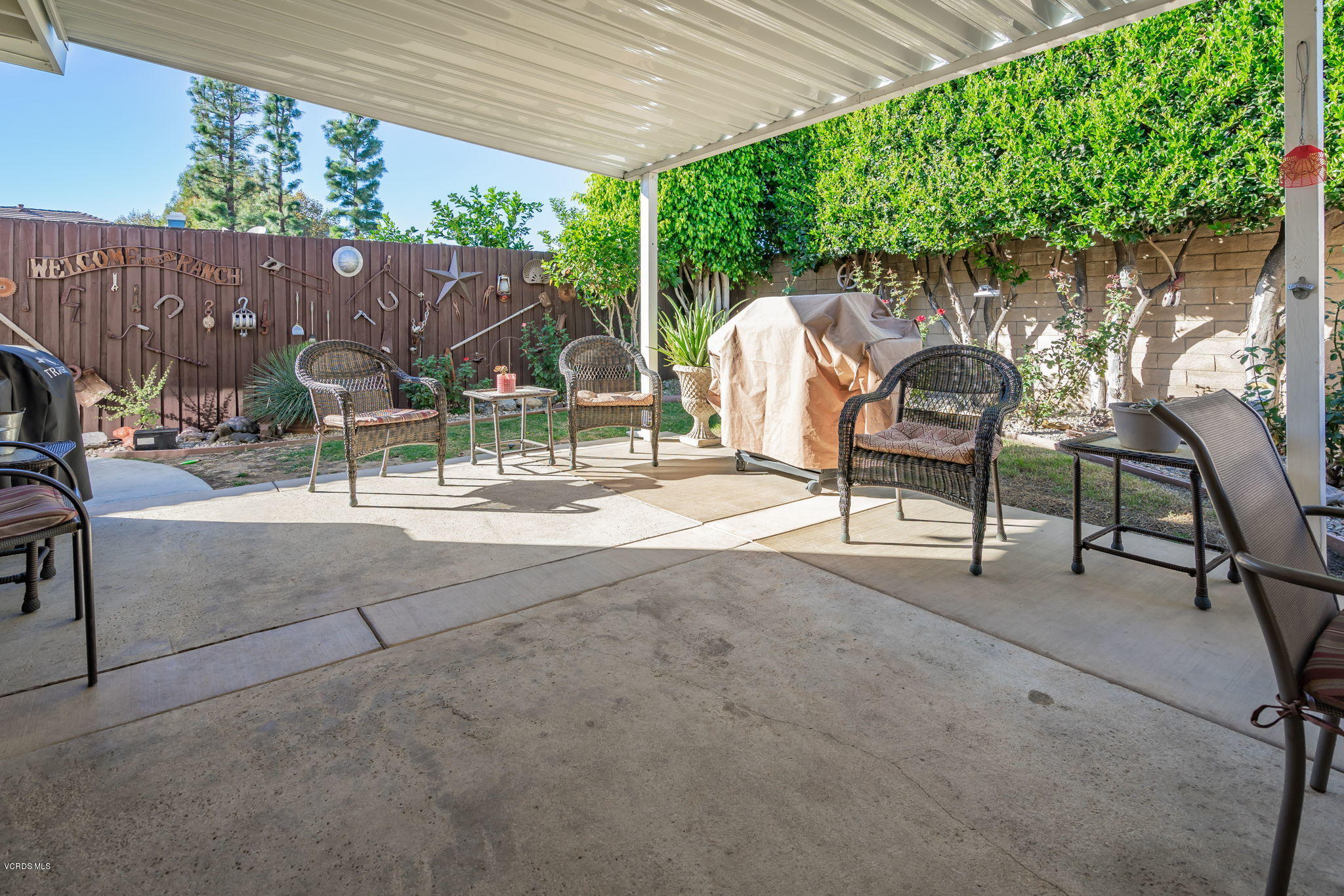 6116 Al Way Simi Valley, CA 93063 - Photo 40 of 55 a view of a backyard with a table and chairs