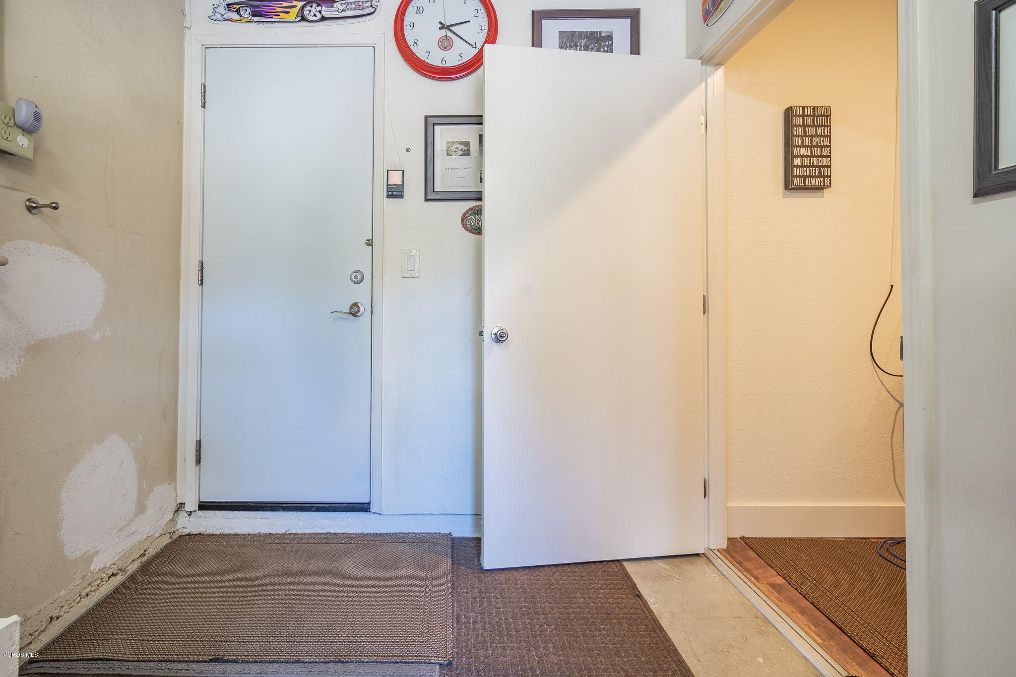 6116 Al Way Simi Valley, CA 93063 - Photo 49 of 55 a view of an entryway with wooden floor