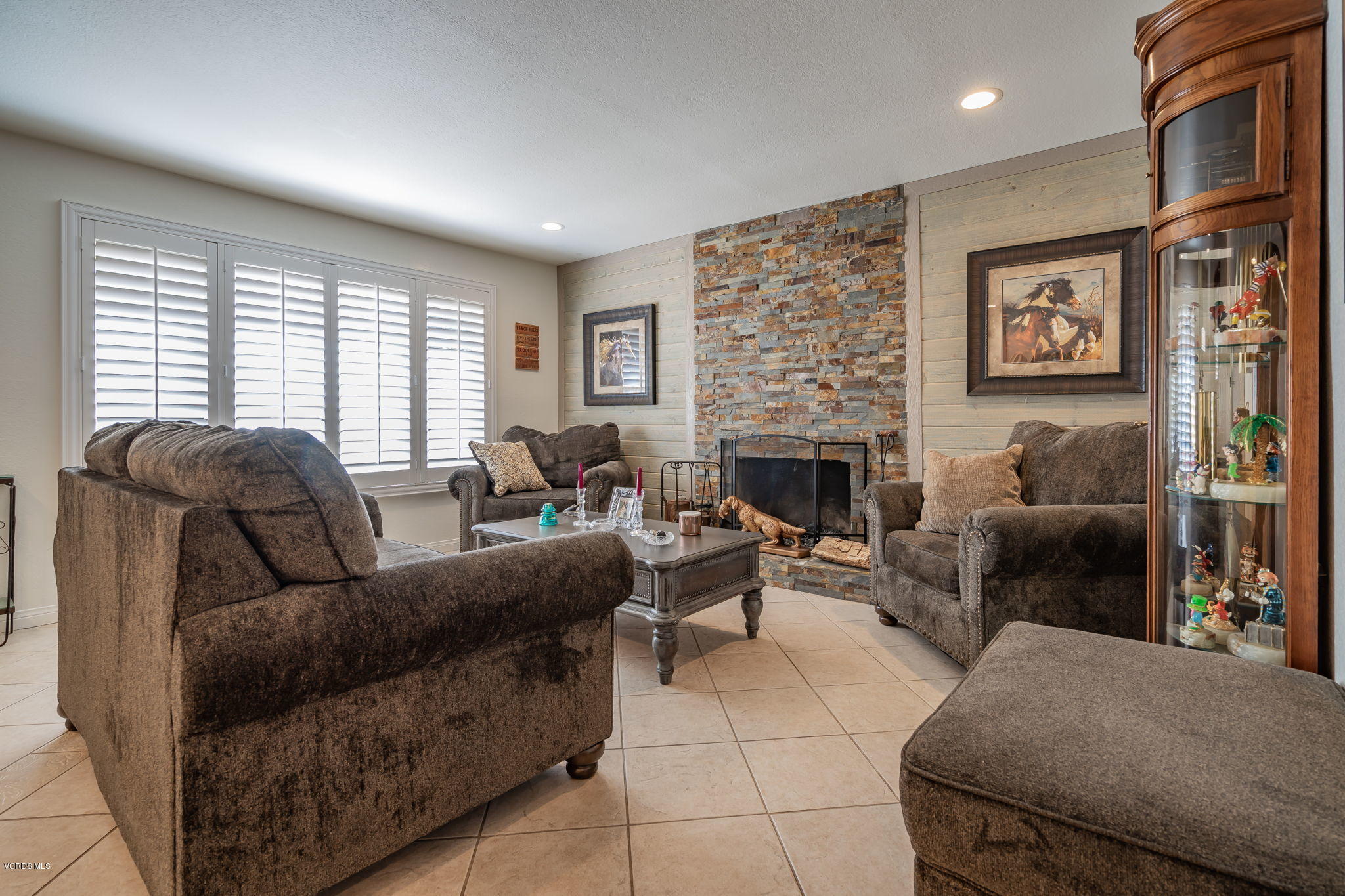 6116 Al Way Simi Valley, CA 93063 - Photo 7 of 55 a living room with furniture and a fireplace