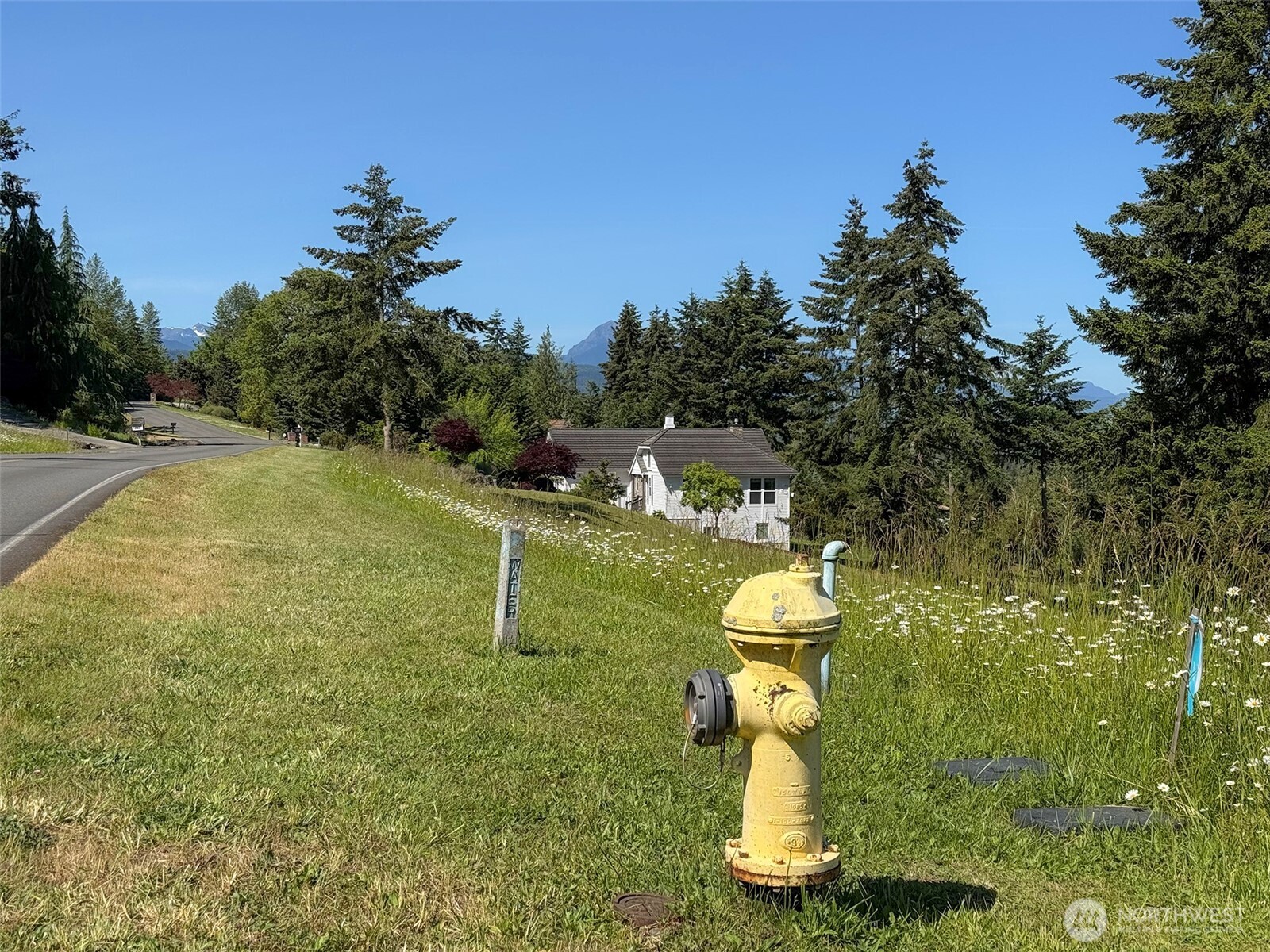 -nka Owls Nest Road Sequim, WA 98382 - Photo 5 of 38 a swimming pool with outdoor seating and yard