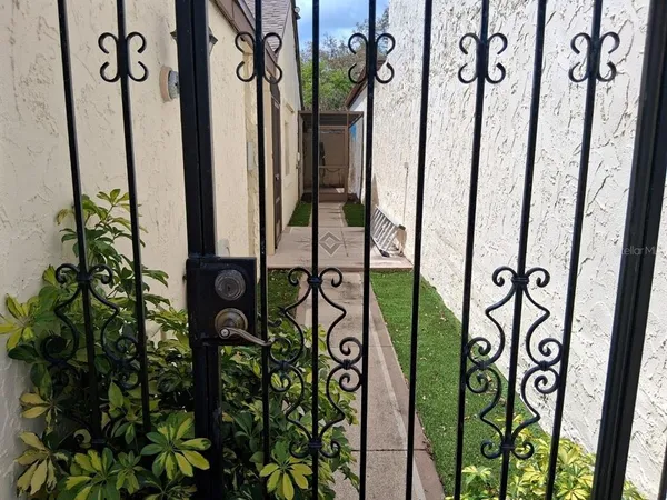 a front view of a house with a glass door and front door