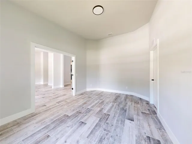 a kitchen with stainless steel appliances granite countertop a sink and a stove top oven